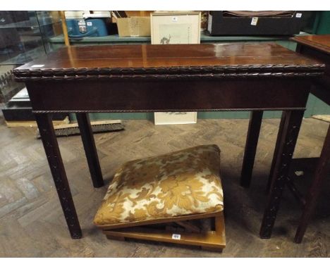 34" Georgian mahogany folding top card table with carved square chamfered legs (one leg needs repair and small splits to top)