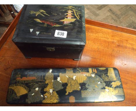 Oriental figure decorated lacquered box and a lacquered trinket box 