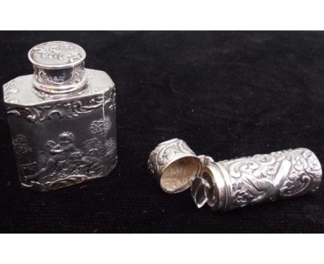 Late 19th century silver scent flask with clear glass stopper and embossed decoration of birds, flowers and foliage.  London 