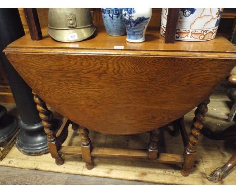 3' oval oak gate leg table on barley twist legs 