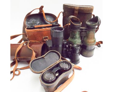 Collection of old binoculars, monocular and opera glasses, some with leather cases to include a pair of brass naval binocular