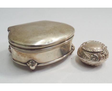 Silver trinket box on small legs with silk lined interior, 7.5 cms wide, together with a silver circular embossed pill box