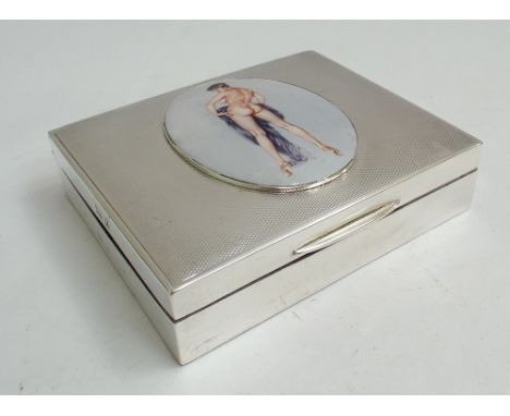1950's silver cigarette case with engine turned decoration and applied oval depicting a nude female figure.  Birmingham 1958.