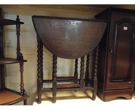 2' 3 oval oak gate leg table with barley twist legs