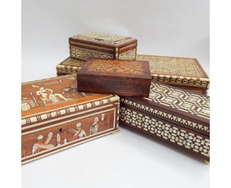 Five wooden inlaid trinket boxes including Middle Eastern examples inlaid with ivory, mother of pearl and bone, largest 33cm 