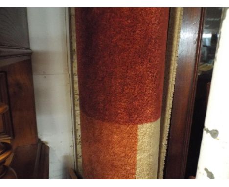 Large terracotta patterned rug and a white painted dressing stool 