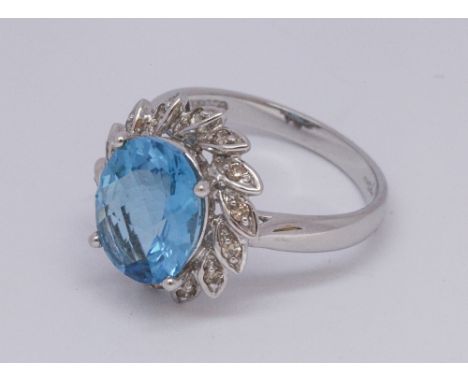 9ct white gold blue topaz and diamond cluster ring - appx size M