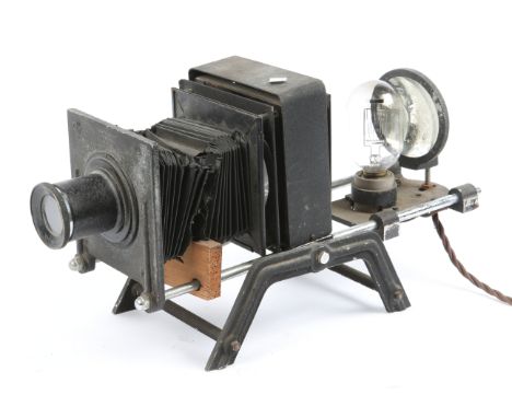 ENBEECO COLD LIGHT ILLUMINATING MAGNIFIER by Newbold & Bulford together with a Newton & Co. slide viewer (2)