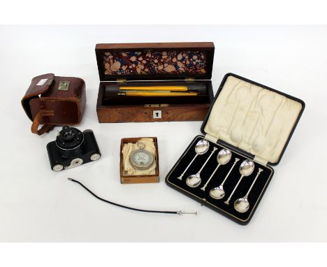 A DR. AUG. NAGEL STUTGART RANKER CAMERA in brown leather case together with a Watkins Bee meter, six silver teaspoons and a r