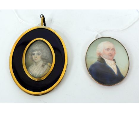 A GEORGIAN OVAL PORTRAIT MINIATURE of a lady with a white blouse and yellow coat and set within a blue glass and gilt metal f