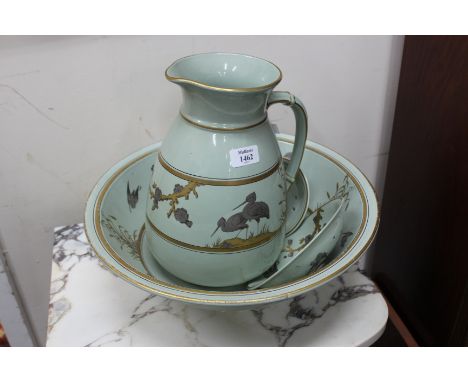 A VICTORIAN PINDER, BOURNE & CO. PART WASH SET consisting of a jug , basin, soap dish and cover decorated in celadon glaze wi