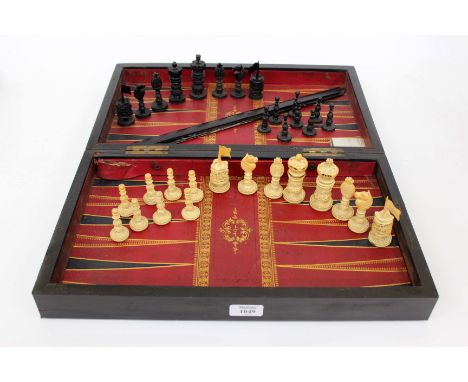 A 19TH CENTURY CARVED IVORY CHESS SET 8.5cm high together with an ebony veneered and mother of pearl inlaid opening chess boa