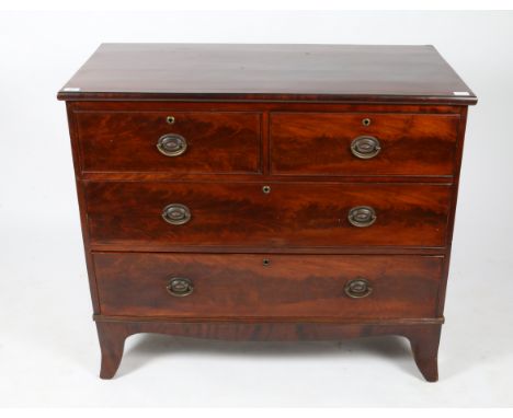 A 19TH CENTURY MAHOGANY CHEST of two short and two long drawers standing on outswept bracket feet, 107cm wide x 93.5cm high