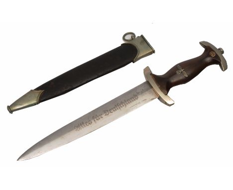 A GERMAN WORLD WAR II S. A. DAGGER issued from the Niederrheim District, overall 36.5cm in length including the scabbard