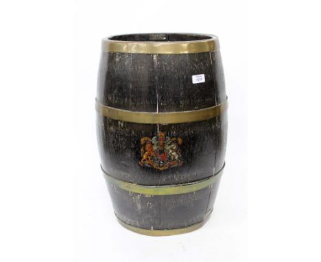 AN OAK OVAL BRASS BOUND COOPERED STICK STAND with applied Royal Coat of Arms, 60cm high and with Made from Battleships of Bri