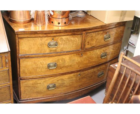 A GEORGE III MAHOGANY BOW FRONTED CHEST of two short and two long drawers standing on splaying bracket feet 105.5cm wide x 84