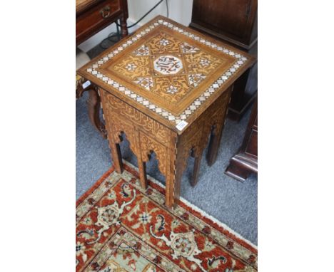 AN EARLY 20TH CENTURY MOORISH STYLE SQUARE OCCASIONAL TABLE with mother of pearl and satinwood inlay, possibly originaly reta