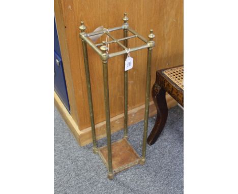 A LATE 19TH / EARLY 20TH CENTURY BRASS STICK STAND of square form 67cm in height 
