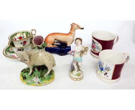 A SMALL GROUP OF POTTERY and porcelain to include a Staffordshire hound pen stand, a 19th Century bone china trio of coffee c