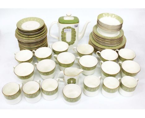 A ROYAL DOULTON SONNET PATTERN PART DINNER, TEA  AND COFFEE  SERVICE with tea cups, coffe cans, a coffee pot, plates, bowls, 