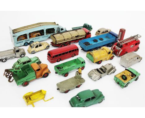 A GROUP OF VARIOUS DINKY TOYS to include a liquid transporter, a fire engine, a car transporter, various cars, buses, lorries