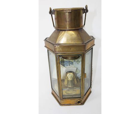AN EARLY 20TH CENTURY BRASS BULK HEAD LAMP stamped Bullpit & Sons 1912, 40cm in height