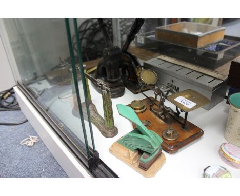 A SET OF POSTAL SCALES on a hardwood base, an old fishing gaff, a cribbage board, a set of small postal scales, 