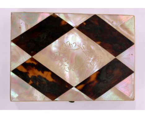 A VICTORIAN MOTHER OF PEARL AND TORTOISESHELL CALLING CARD CASE with floral carved decoration 11cm wide 
