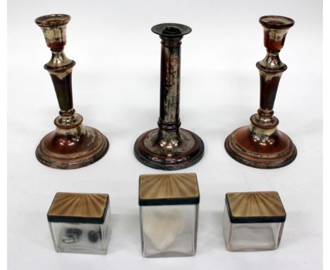 A SET OF THREE SILVER ENGINE TURNED ENAMEL DECORATED RECTANGULAR LIDDED GLASS DRESSING TABLE BOXES the tallest 8.5cm high, to