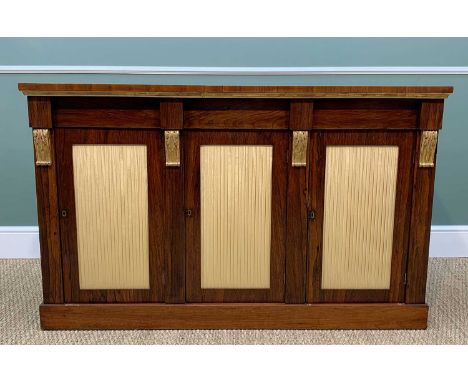 GOOD REGENCY ROSEWOOD &amp; PARCEL GILT SIDE CABINET, rectangular moulded top above three frieze drawers and pleated cloth cu