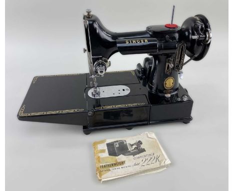 SINGER 222K FEATHERWEIGHT CONVERTIBLE PORTABLE SEWING MACHINE circa 1953, complete with case, manual and accessories, in supe