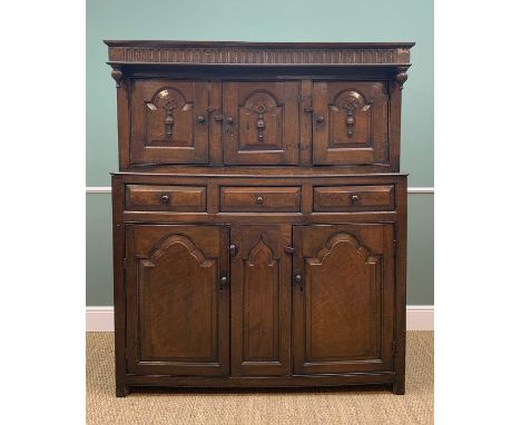 18TH CENTURY WELSH OAK DEUDDARN, Snowdonia, arcaded cornice, above three fielded panel doors with applied spindle ornament, t
