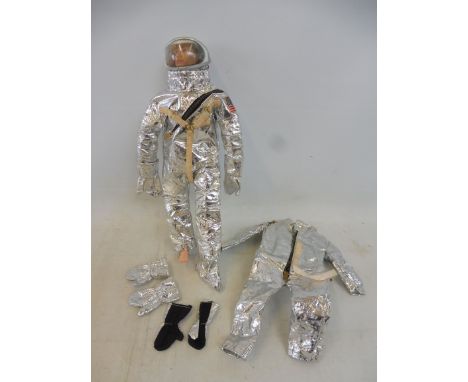 An original blue pants Action Man figure in a American astronaut's outfit with additional space accessories. 