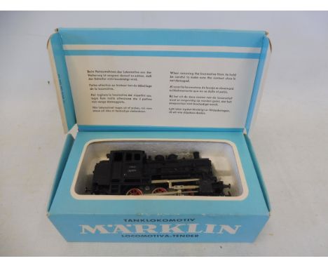 A boxed Marklin tank locomotive.