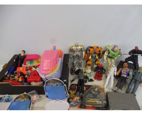 A selection of action figures: Star Wars, Toy Story, large-scale Polly Pocket etc. 