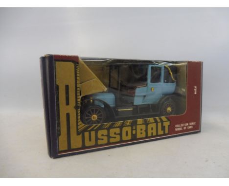 A 1:43 scale die-cast and plastic Russobalt retro car, in original box, made in the USSR.