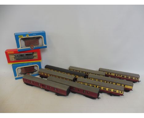 A boxed Hornby GWR 20 ton brake van '114775 Worcester', two boxed Airfix ventillated wagons and two BR maroon Mk.I parcel van