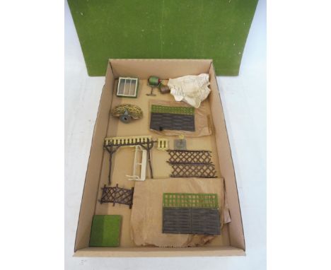 A quantity of Britains garden, excellent condition for age, including grass rollers, cloche, peacock, sundial, balustrades, s