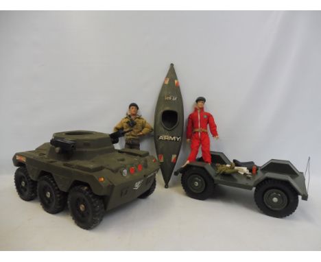 A selection of Action Man vehicles, an original Action Man and a soft-head Action Man.