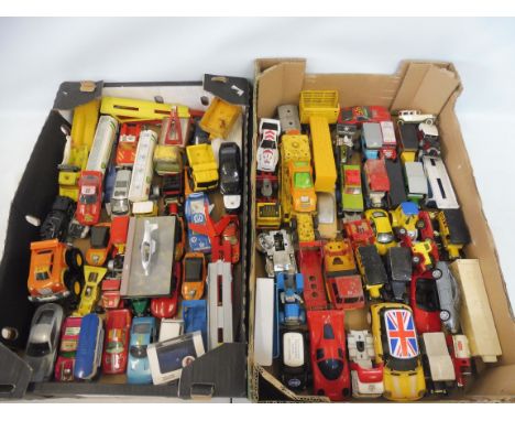 A large quantity in two trays of larger scale die-cast vehicles to include Lesney, Matchbox etc. all playworn. 