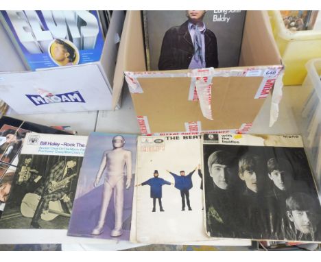 A quantity of 1960s LPs: Beatles, Bob Dylan, Simon &amp; Garfunkel, Doors, The Hollies etc. 