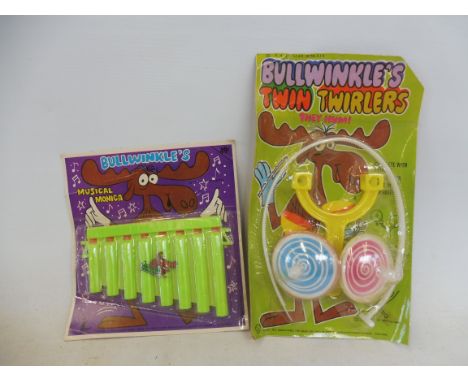 Two carded Hong Kong rack toys: Bullwinkles and Twin Twirlers plus Bullwinkles Harmonica.