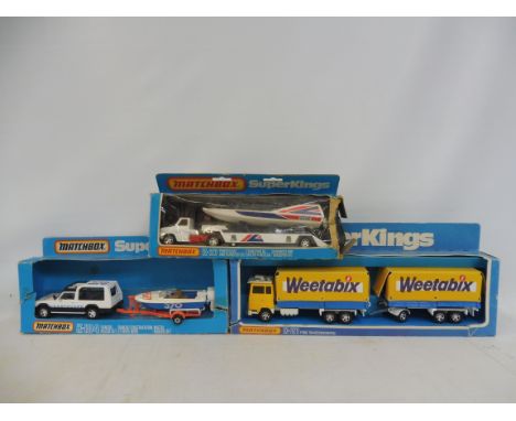 Three Matchbox SuperKings, boxed, K104 Rescue set, a K21 Ford Weetabix Trans-Continental and a K27 Powerboat. 