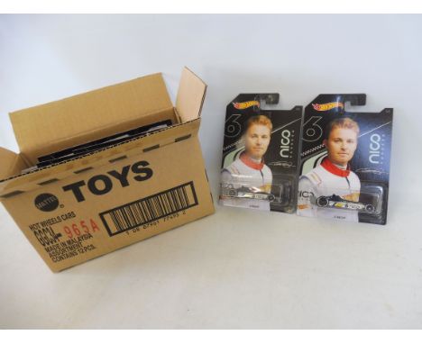 A trade pack complete, in excellent condition - Mattel Hot Wheels, carded Nico Rosberg, various  (12 pieces).