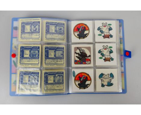 Pokemon - An album containing approximately 80 Pokemon Daiichi Pan Bread / Decochara seal stickers and similar. Items appear 