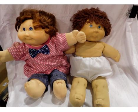 Two vintage Cabbage Patch kids, girl with blue eyes, dress and jeans, boy with blue eyes in nappy, H: 43 cm. UK P&amp;P Group