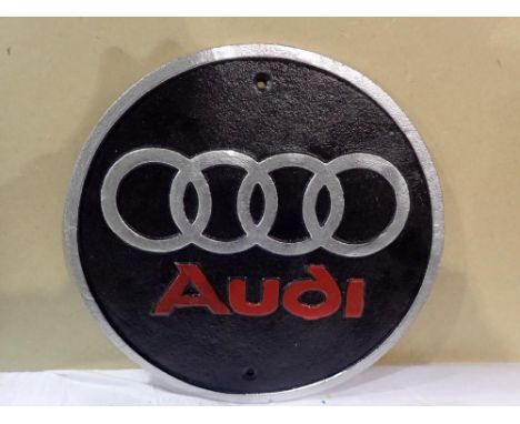Cast iron Circular Audi sign, D: 25 cm. UK P&amp;P Group 1 (£16+VAT for the first lot and £2+VAT for subsequent lots) 