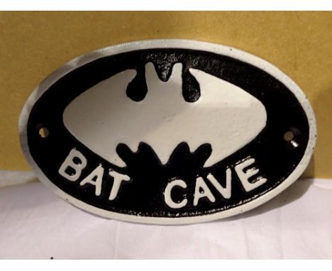 Cast iron Bat Cave sign. W: 15 cm. UK P&amp;P Group 1 (£16+VAT for the first lot and £2+VAT for subsequent lots) 