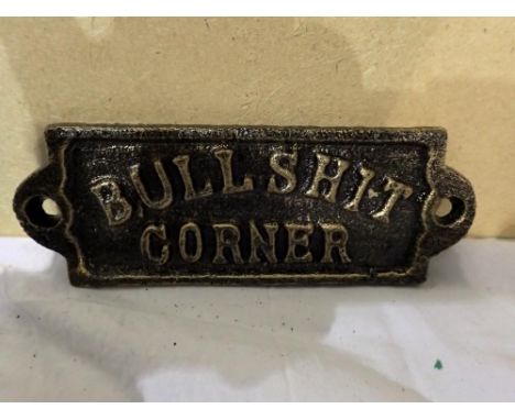 Cast iron Bull**** corner sign, W: 12 cm. UK P&amp;P Group 1 (£16+VAT for the first lot and £2+VAT for subsequent lots) 