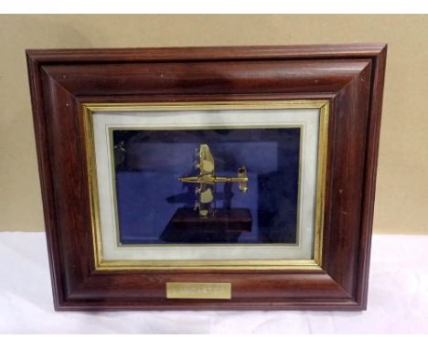 Framed metal Lancaster bomber om a wooden plinth, overall 21 x 26 cm. UK P&amp;P Group 2 (£20+VAT for the first lot and £4+VA